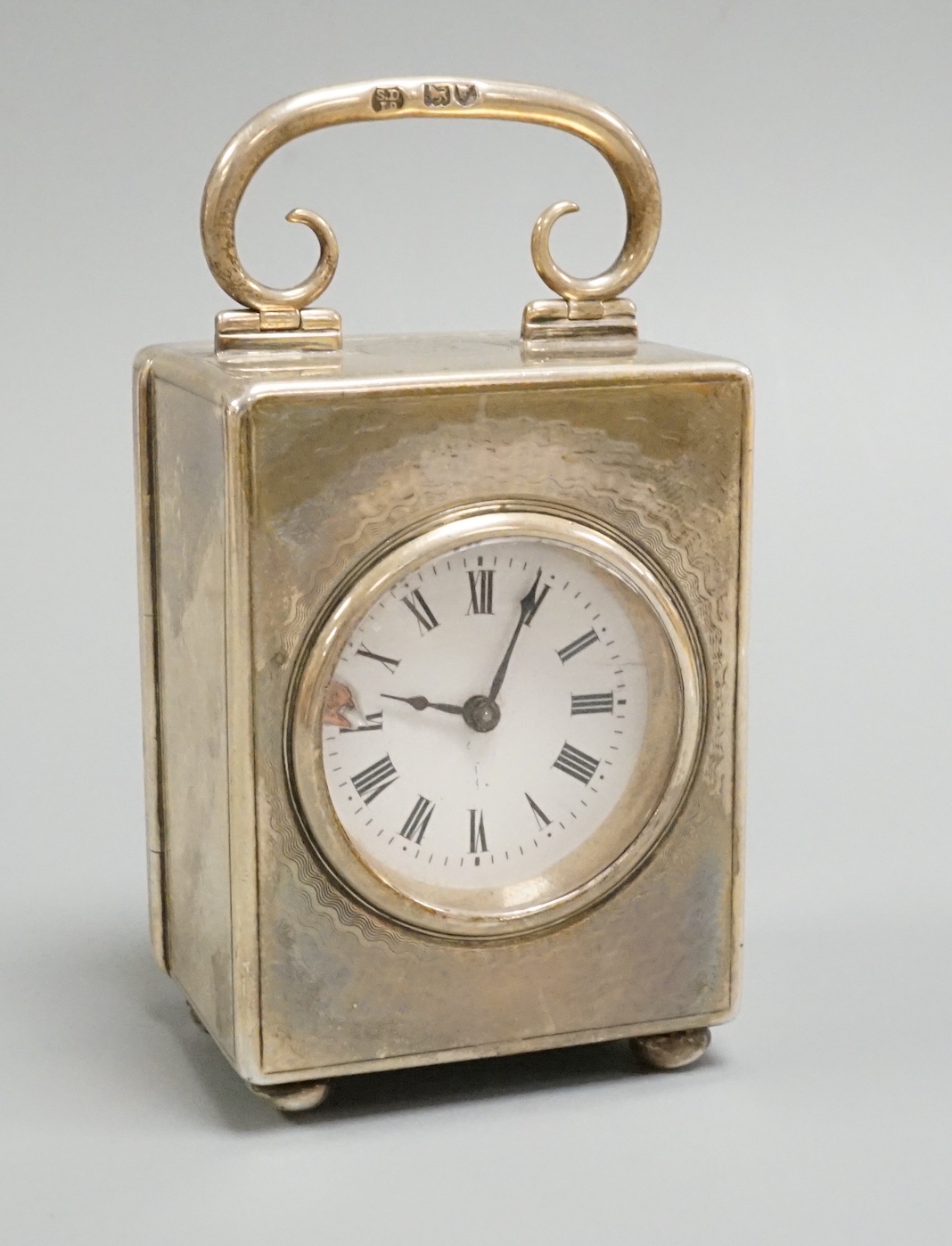 An Edwardian silver cased miniature carriage timepiece, Stewart Dawson & Co Ltd, London, 1909, height 73mm (dial a.f.).